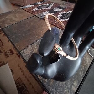 Gold Snake Bracelet with Green Gem